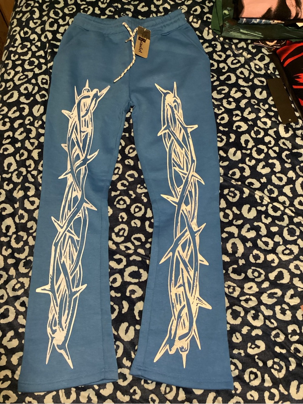 RESA Blue Sweatpants with White Thorn Motif